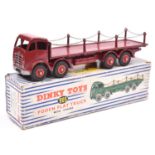 A Dinky Toys Foden Flat Truck with Chains (905). In maroon with maroon wheels. Boxed, some wear.