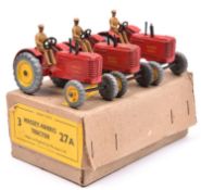 A Dinky Toys 3-vehicle Trade Box (27A). Containing 3 Massey Harris Tractors. In red with yellow