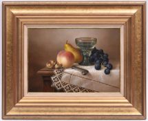 Brian Davies (1942 - 2014), oil painting on canvas. A still life with glass and fruit. Signed in the