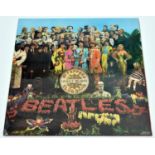 The Beatles - Sgt. Pepper's Lonely Hearts Club Band. Parlophone stereo 12" vinyl record. Made in Gt.