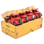 A Dinky Toys 4-vehicle Trade Box (410/25M). Containing 4 Bedford End Tippers. In red with cream body