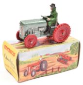 A scarce Benbros Qualitoy 'Farm Equipment' Ferguson Tractor. Painted in metallic green hammered
