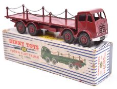 A Dinky Toys Foden Flat Truck with Chains (905). In maroon with maroon wheels. Boxed, some wear