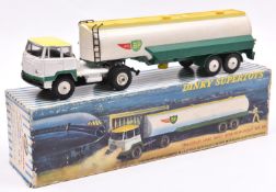 A French Dinky Supertoys Tracteur Unic Avec Semi-Remorque 'Air BP'. In white, yellow & green with