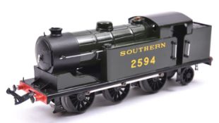 An O gauge electric tinplate Southern Railway 0-6-2T locomotive, 2594. Based on a Class N2 tank