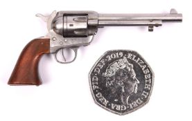 A well detailed miniature model of a Colt Frontier revolver, 2½" overall. GC £40-50