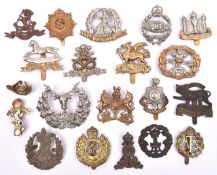 20 various cap badges, mostly regular infantry, including pre 1935 Norfolk Regiment (slider