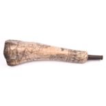 An interesting animal bone powder flask, possibly 17th century or earlier, carved overall with a