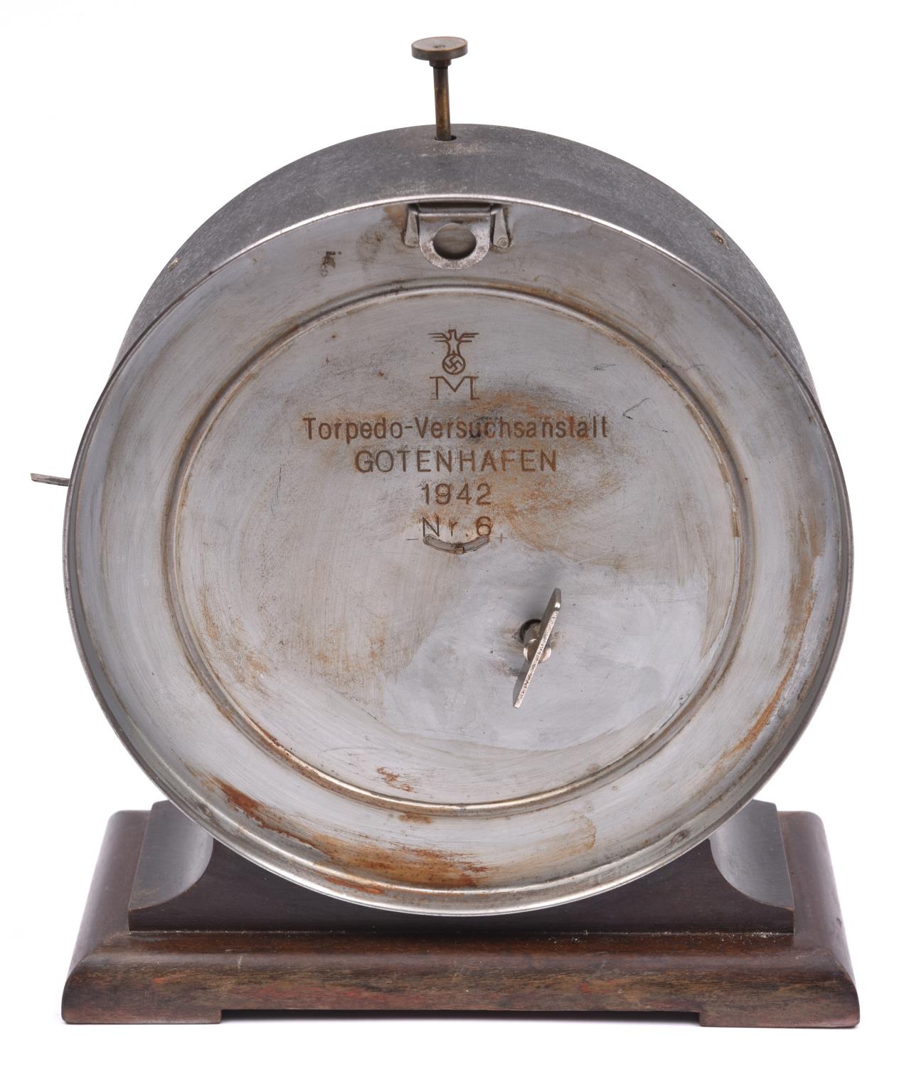 A Third Reich U Boat torpedo timer, circular body 8" diameter, face marked "Junghans", back marked - Image 2 of 2