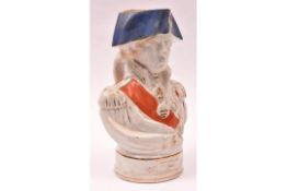 An old glazed earthenware "character" jug in the form of Admiral Nelson, wearing medals and