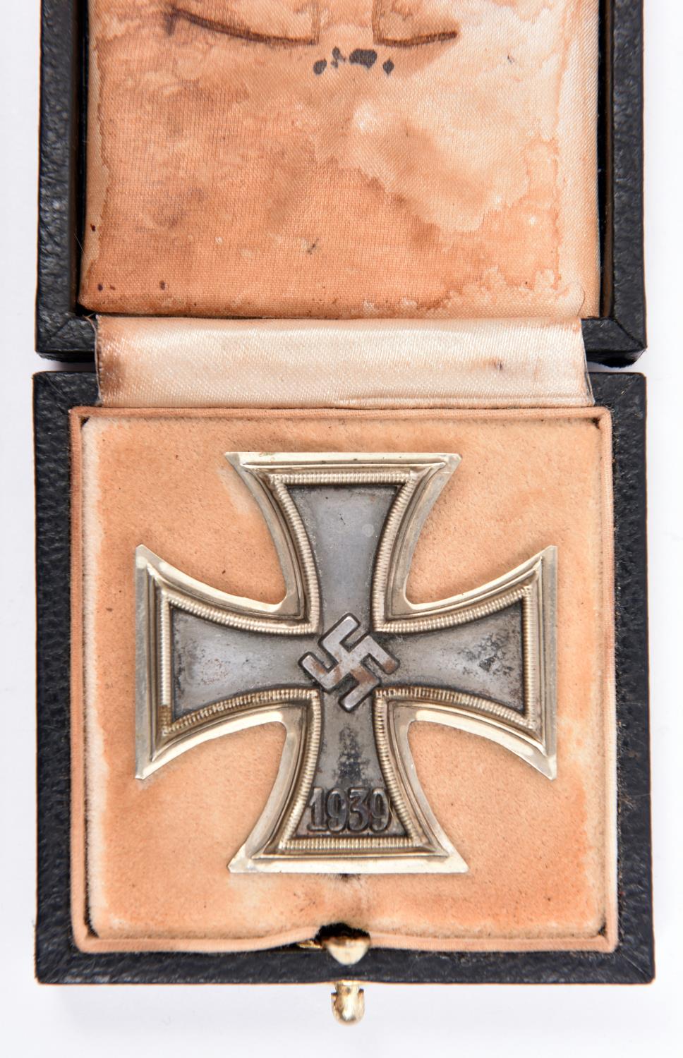 A Third Reich Iron Cross 1st class, in its original issue case, GC (case lining stained) £40-50