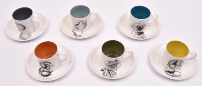 A Susie Cooper coffee set. A set of six 'Black Fruit' coffee cans and saucers. VGC. £30-50