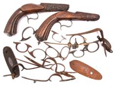 Antique gun parts, comprising 5 trigger guards for longarms, including iron trade gun and
