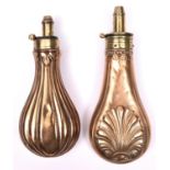 An embossed copper powder flask "Fluted" (R269, no rings), 7½" overall, with common top. GC (