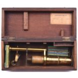 A late 19th Century/early 20th Century microscope. With alternative lens and 10x sides. In fitted