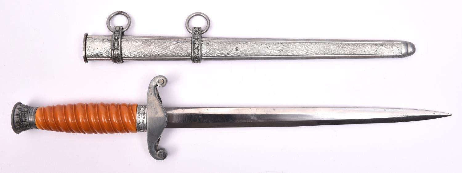 A Third Reich Army officer's dagger, with unmarked blade, grey metal crosspiece and pommel, and