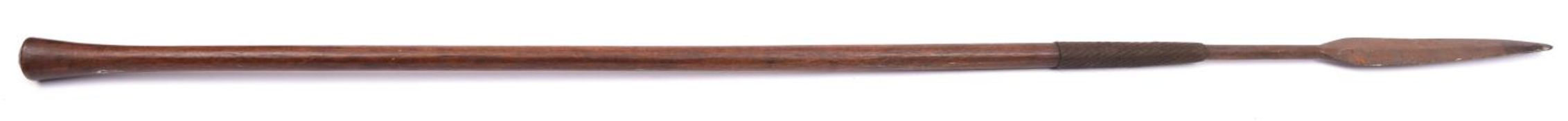 A 19th century Zulu spear Assegai, 47" overall, with leaf shaped blade and band of woven iron