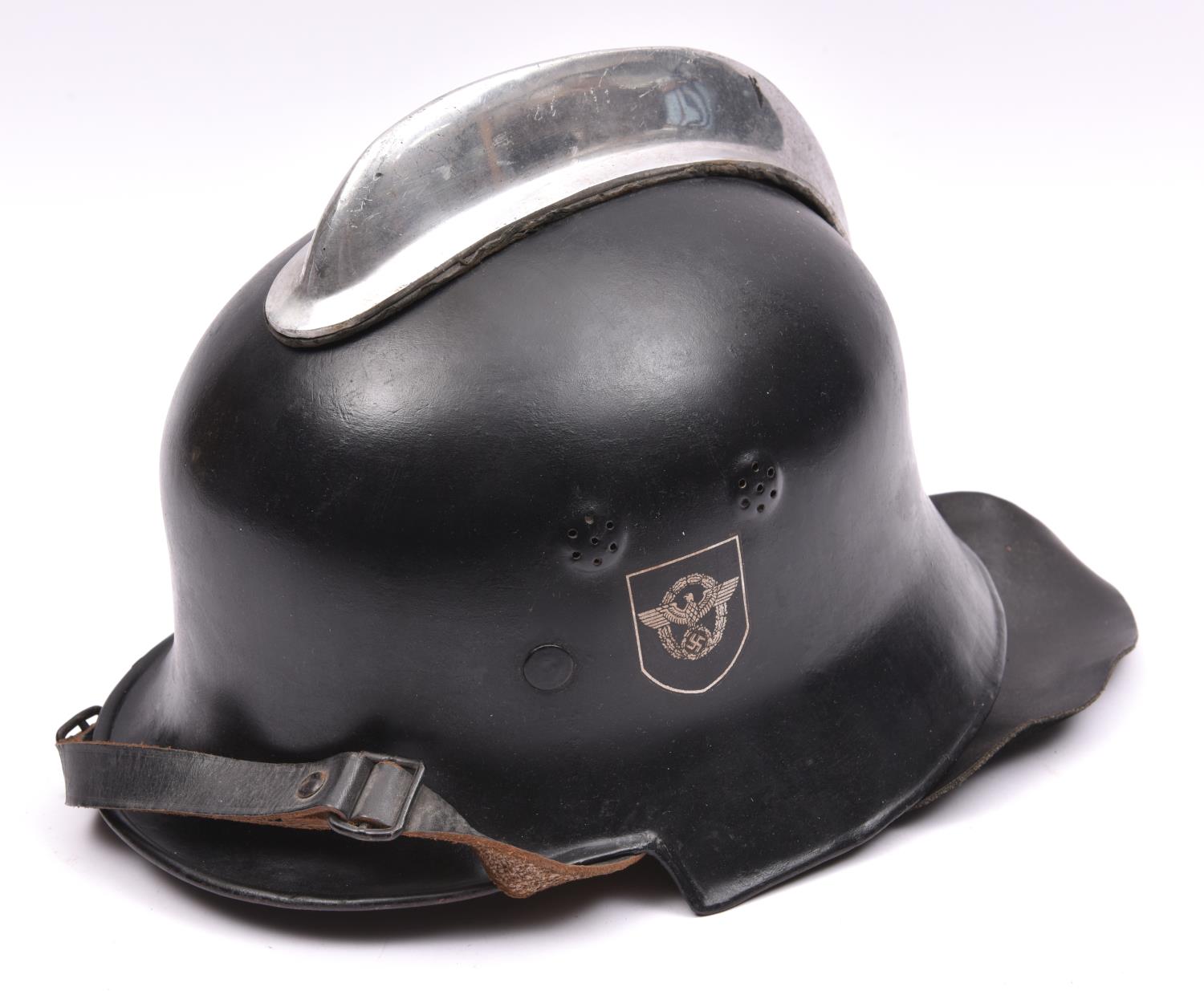 A Third Reich Fireman's steel helmet, blackened skull with decals, plated crest, leather lining