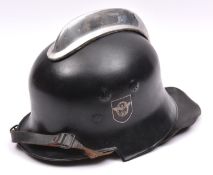 A Third Reich Fireman's steel helmet, blackened skull with decals, plated crest, leather lining