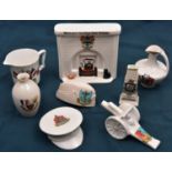 8 pieces of crested china comprising: Field gun, Southsea; SD cap, Portishead; FS cap St Leonards;