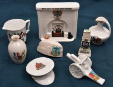 8 pieces of crested china comprising: Field gun, Southsea; SD cap, Portishead; FS cap St Leonards;