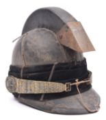 A mid 19th century continental cavalry officer's helmet, with leather skull, peak and crest, brass