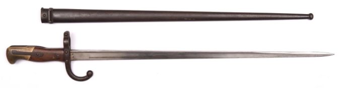 A French 1874 pattern Gras bayonet, the blade marked "St Etienne 1879", in its scabbard, the bayonet