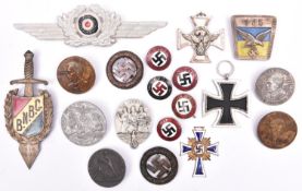 A Third Reich Mothers Cross in gilt and enamel, 5 enamelled party badges; 6 Day badges; a police