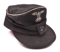 A Third Reich SS field cap, black material with alloy braid and embroidered badge. Lining marked "