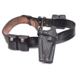 A Tex Shoemaker black leather basket weave belt with Safariland holster, for revolver and twin speed