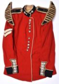 A post 1953 Corporal's scarlet tunic of the Welsh Guards, anodised buttons; together with a pair