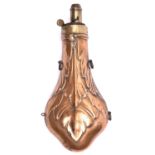 An embossed copper powder flask "Shapes" (R1345), 7½" overall, with common top and hanging rings. GC