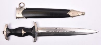 A Third Reich SS man's dagger, 8½", blade etched "Meine Ehre Heist Treue", maker Puma Solingen. In