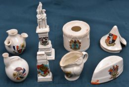 8 pieces of crested china comprising: Glengarry cap, Blackpool; drum, Bearwood; War memorial,