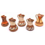 5x Myott, Son & Co. pottery jugs. Hand painted 1930s examples in Art Deco colours. Tallest 190mm.