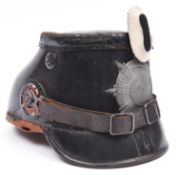 A scarce Imperial German Guard Jager enlisted man's shako, with dull grey metal badge, black and