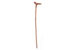 A Boer War period St Helena Prisoner of War carved walking stick, the slender haft carved ?ST.
