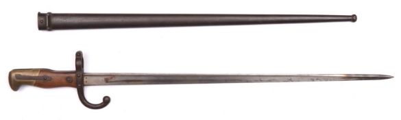 A French 1874 pattern Gras bayonet, the blade marked "St Etienne 1878", in its scabbard, the bayonet