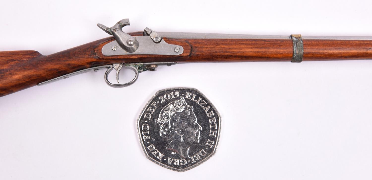 A miniature model of a Continental-style 3 band military percussion musket, 10" overall, with - Image 2 of 2
