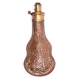 An embossed copper powder flask "Foliage" (R662, no rings), 8" overall, with patent top and