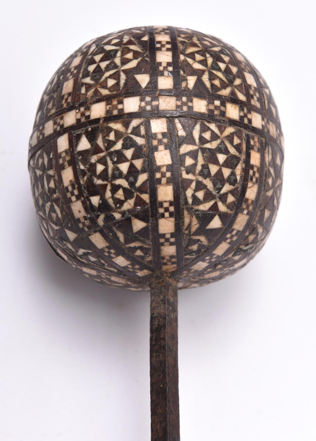 A Caucasian ball topped iron marker (?), the 16½" iron haft of rectangular section, the spherical