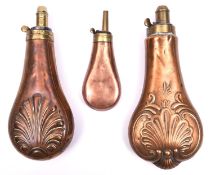 An embossed copper powder flask "Shell", 7½" overall, with common top, basically GC (slightly worn