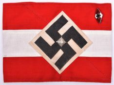 A Third Reich Hitler Youth armband, with applied diamond swastika patch and centrally mounted "Pip";