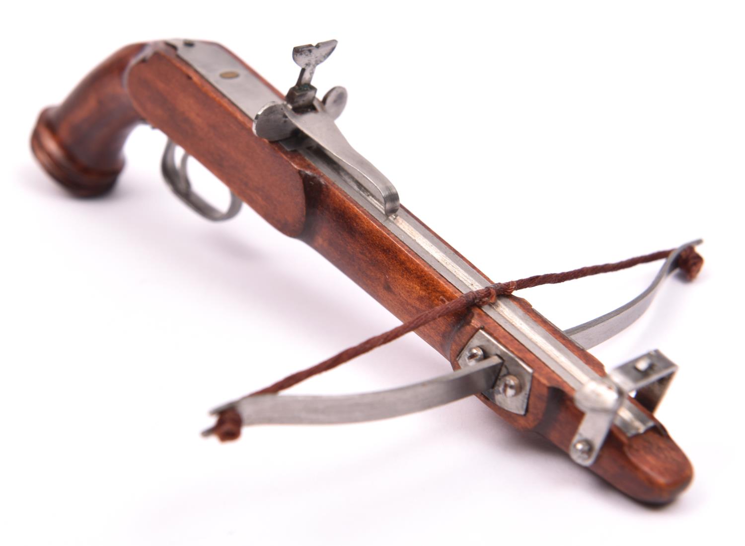 A miniature model of a pistol crossbow, length 4½", span 3½". GC £30-40 - Image 2 of 2