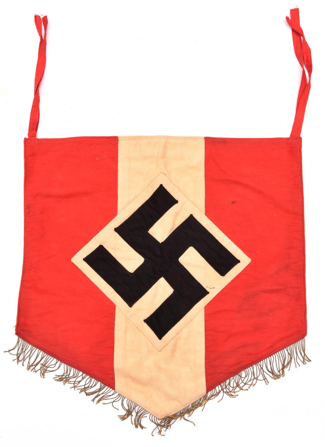 A good Third Reich Hitler Youth trumpet banner, of red and white cloth with applied diamond swastika