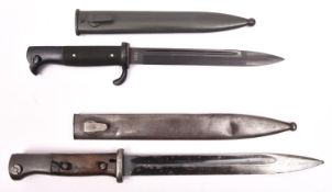 A post war German (?) bayonet, blackened blade 7½" with narrow fullers, etched "TSR", blackened hilt