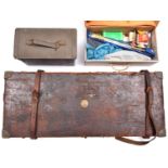 A partly brass bound leather covered gun case, originally for a pair of shotguns, 32" x 12"
