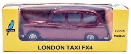 A rare Budgie Colour Trial No.703 London FX4 Taxi. An example finished in deep metallic maroon