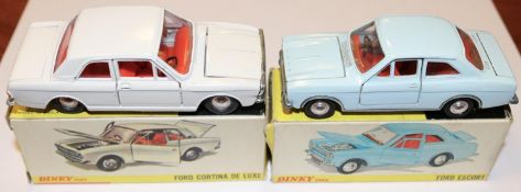 2 Dinky Toys. Ford Cortina De Luxe (159), finished in white with red interior, spun wheels with