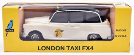 Rare Budgie Colour Trial No.703 London FX4 Taxi. An example finished in white with black roof, Day/